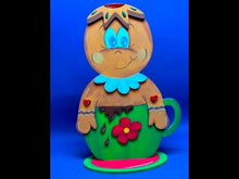 Laden und Abspielen von Videos im Galerie-Viewer, Lebkuchenmännchen mit Kochmütze und Nudelholz