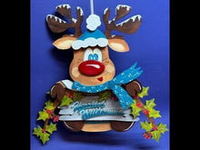 Laden und Abspielen von Videos im Galerie-Viewer, Rentier mit Mütze für Zaun