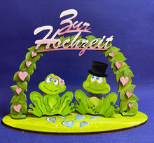 Lade das Bild in den Galerie-Viewer, Komplettset: Frosch-Brautpaar mit Blätterbogen "Zur Hochzeit"