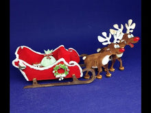 Laden und Abspielen von Videos im Galerie-Viewer, Rentiere mit Schlitten aus Holz