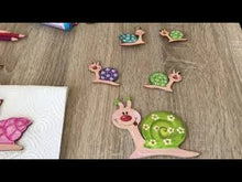 Laden und Abspielen von Videos im Galerie-Viewer, Schnecke lächelnd aus Holz