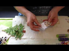 Laden und Abspielen von Videos im Galerie-Viewer, Schneemann aus Holz als Leibgarde für Kantholz