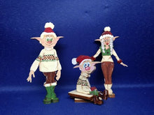 Laden und Abspielen von Videos im Galerie-Viewer, Trollfamilie im Winteroutfit aus Holz