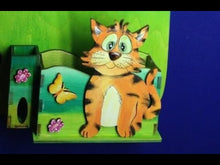 Laden und Abspielen von Videos im Galerie-Viewer, Katze stehend aus Holz