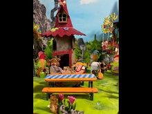 Laden und Abspielen von Videos im Galerie-Viewer, Wichtel mit Instrumente aus Holz sitzend