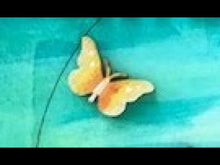 Laden und Abspielen von Videos im Galerie-Viewer, Schmetterling seitlich mit Ausschnitten aus Holz
