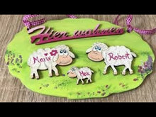 Laden und Abspielen von Videos im Galerie-Viewer, Schaf mit Blume aus Holz