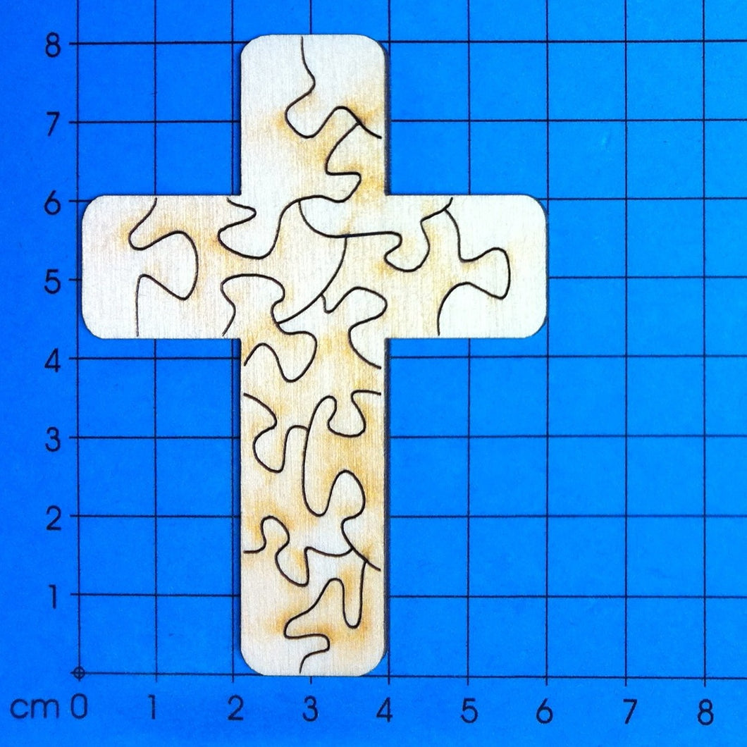 Kreuze als Puzzle aus Holz