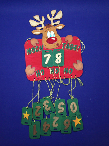 Kalender aus Holzmit Rentier 